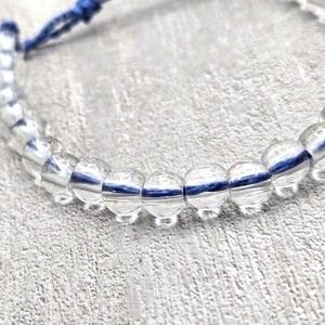 Clear Glass 6mm Beaded 4 Oceans Adjustable Bracelet Thin Blue Cord Handmade Bali